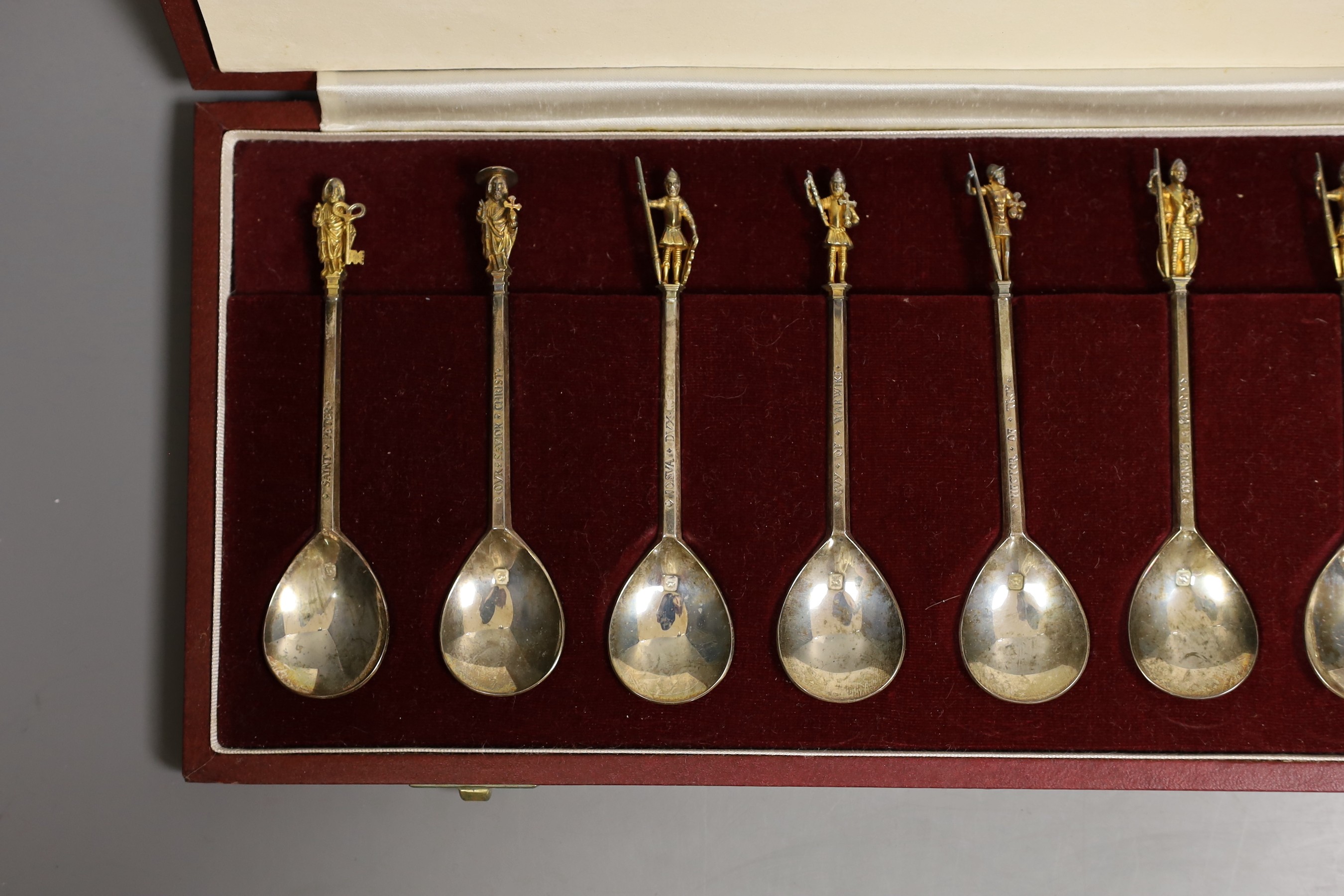 A set of twelve parcel gilt silver commemorative Tichborne spoons, in presentation case, 9oz